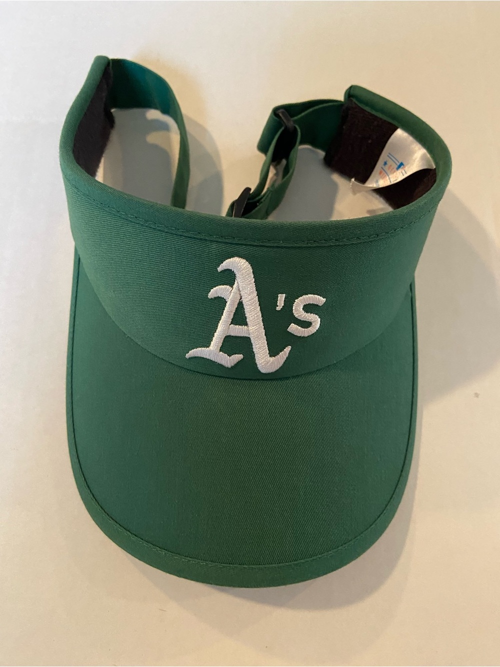 Genuine Merchandise Green Visor with White A's Logo